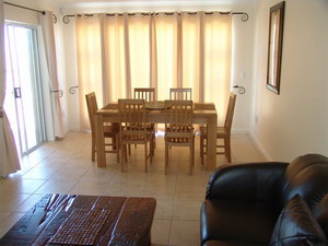 Lounge and dining area - Bradclin Beach - Self-Catering 2 bedroom apartment, Blouberg, Cape Town, Western Cape, South Africa - click for larger image