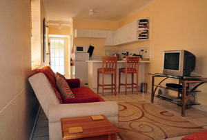 Living room and kitchenette - Bradclin Sport, Newlands - Cape Town, Western Cape, South Africa - click for larger image