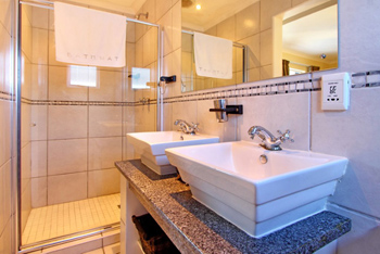 Bathroom, pool facing room at Atlantic Beach Villa
